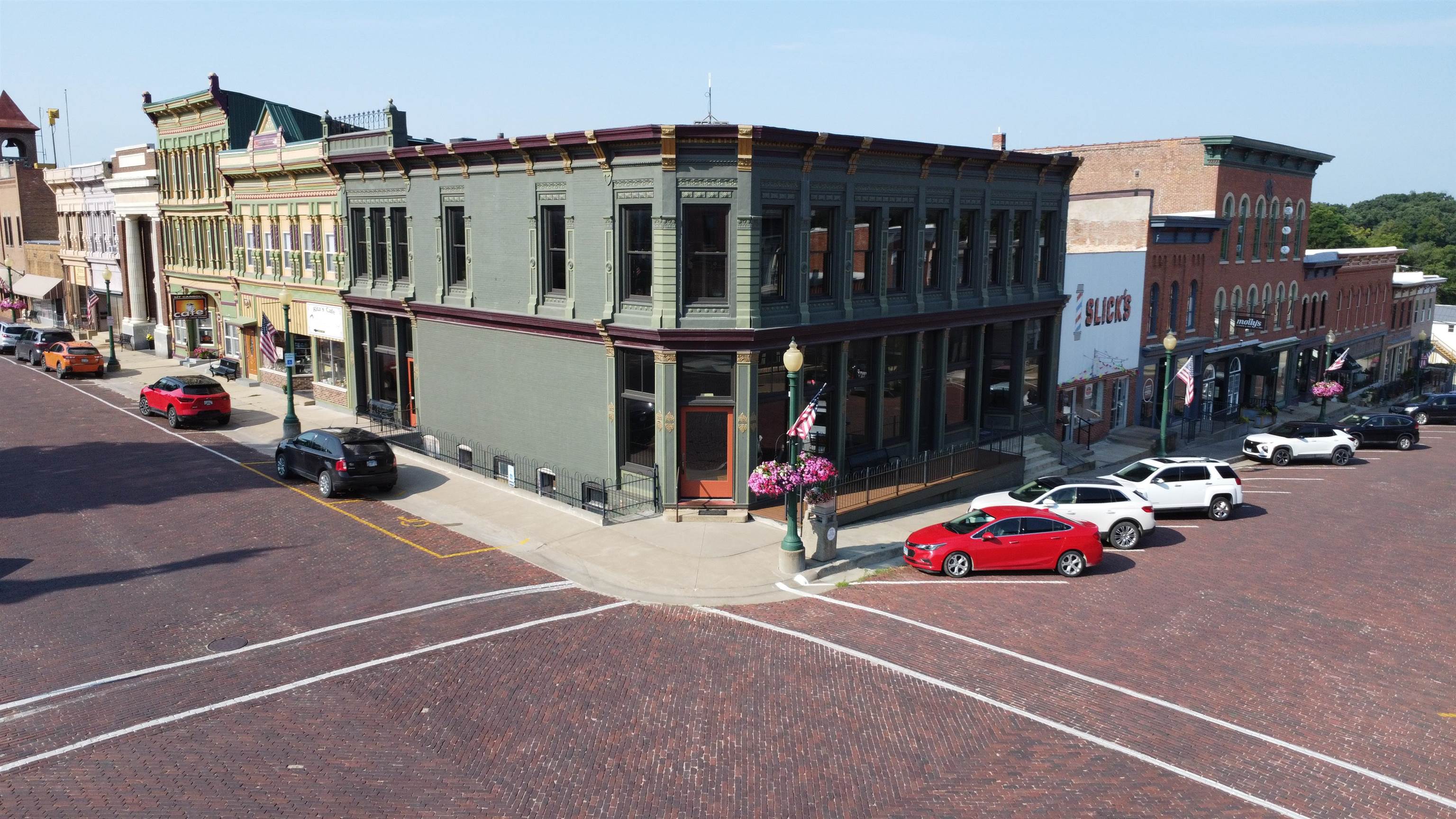 320 North Main Street Mount Carroll, IL 61053 - Photo 26 of 31 a car parked in front of a building