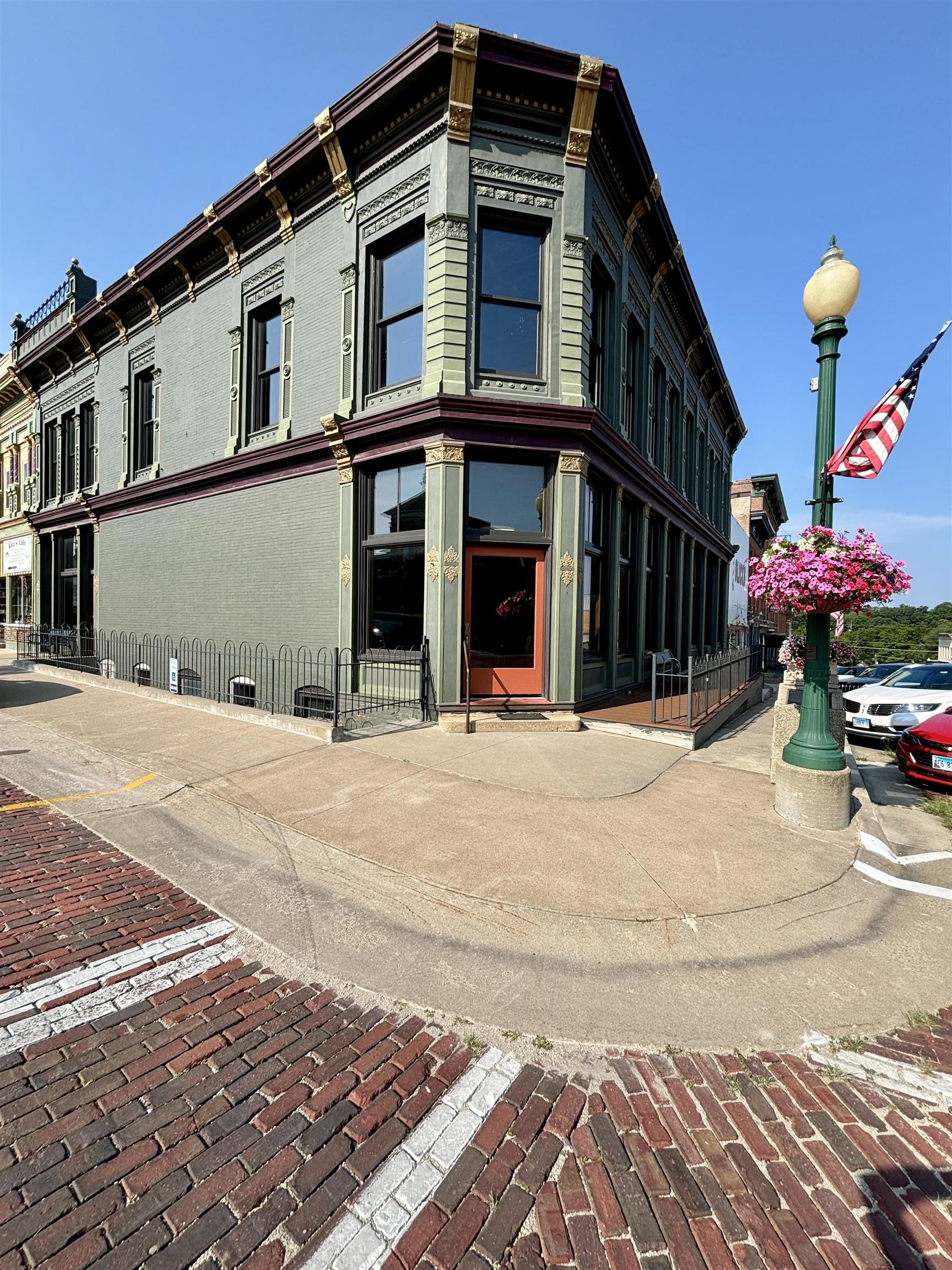 320 North Main Street Mount Carroll, IL 61053 - Photo 4 of 31 a view of a building on the street