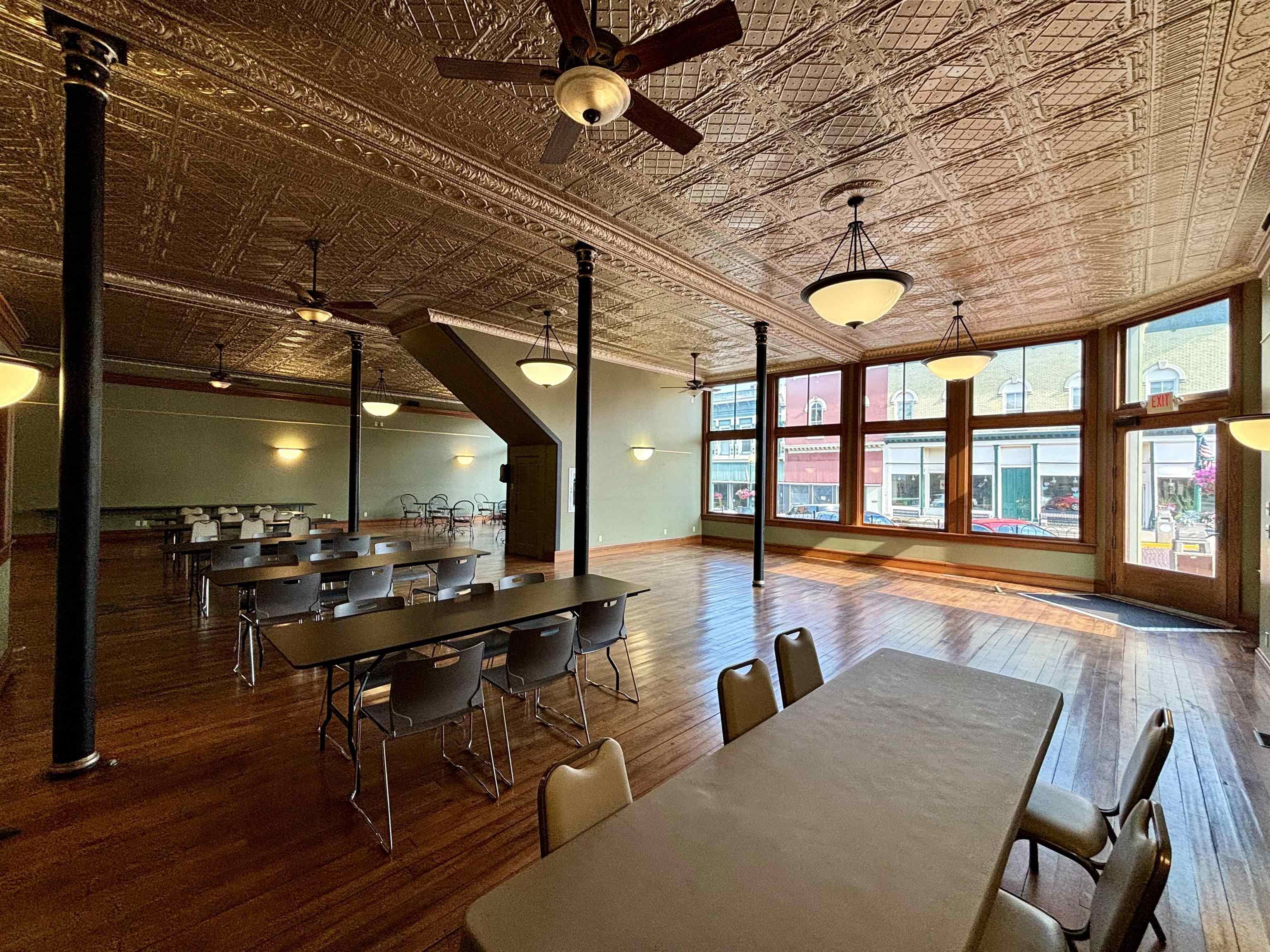 320 North Main Street Mount Carroll, IL 61053 - Photo 9 of 31 a living room with furniture and a large window