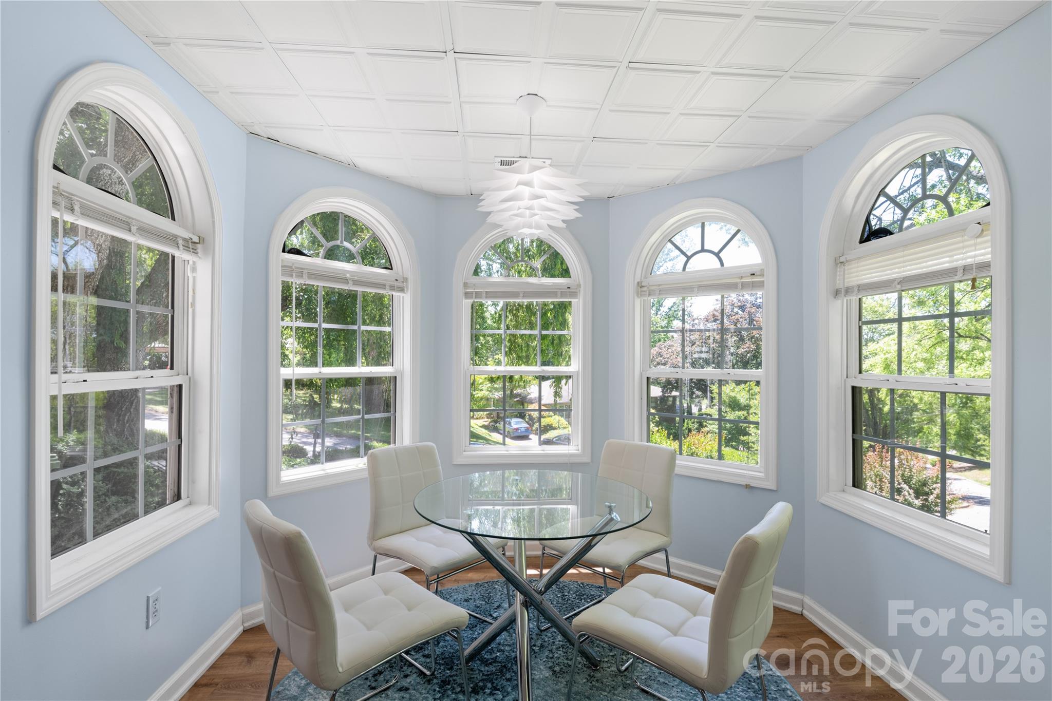 3 Northwood Road Asheville, NC 28804 - Photo 31 of 48 a view of a dining room with furniture large windows and wooden floor