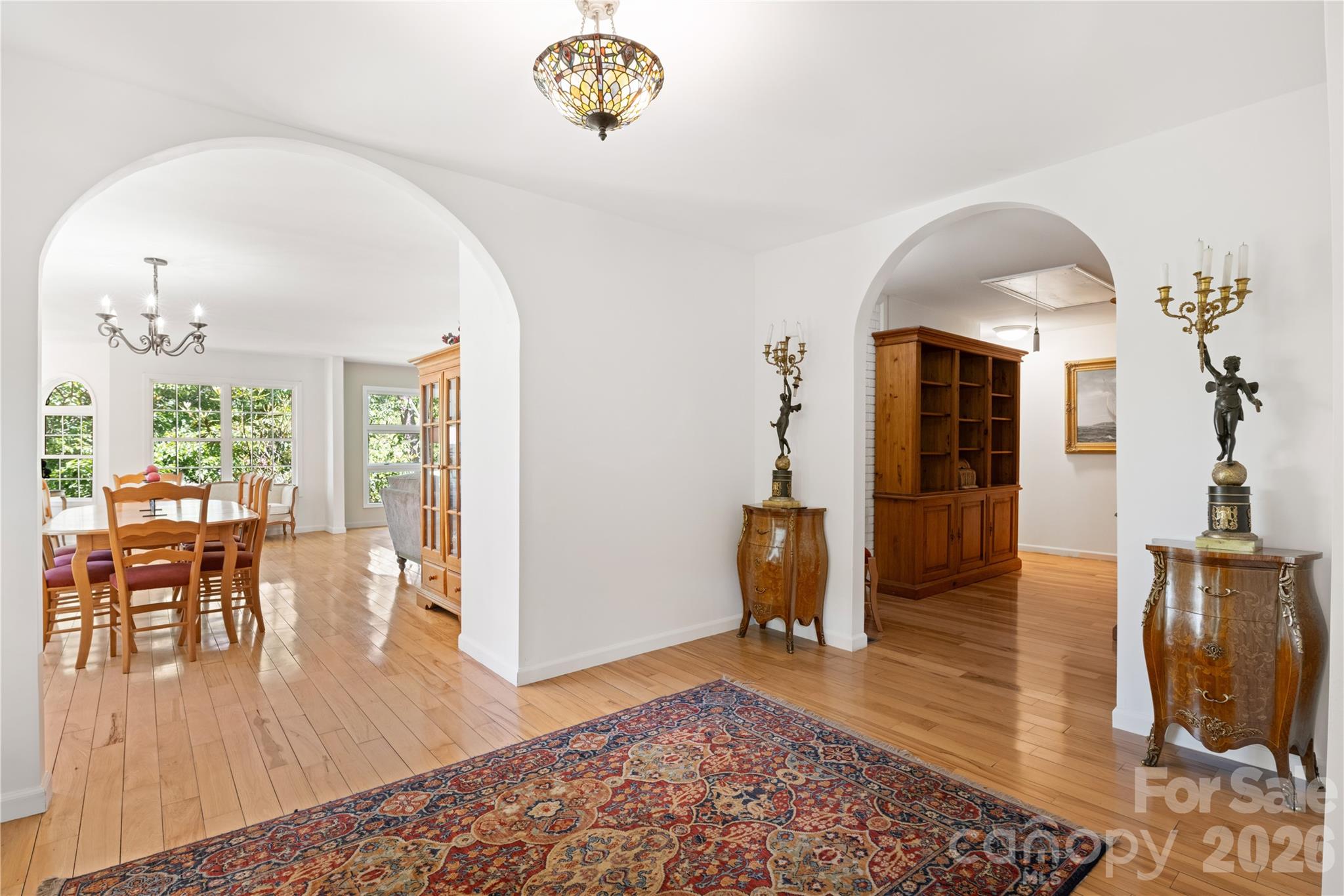3 Northwood Road Asheville, NC 28804 - Photo 7 of 48 a view of a livingroom with furniture wooden floor and a rug