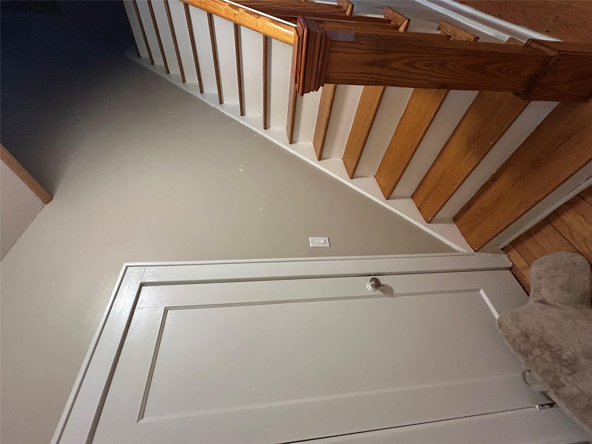 199 Washington Street Poughkeepsie, NY 12601 - Photo 19 of 32 Staircase featuring wood finished floors