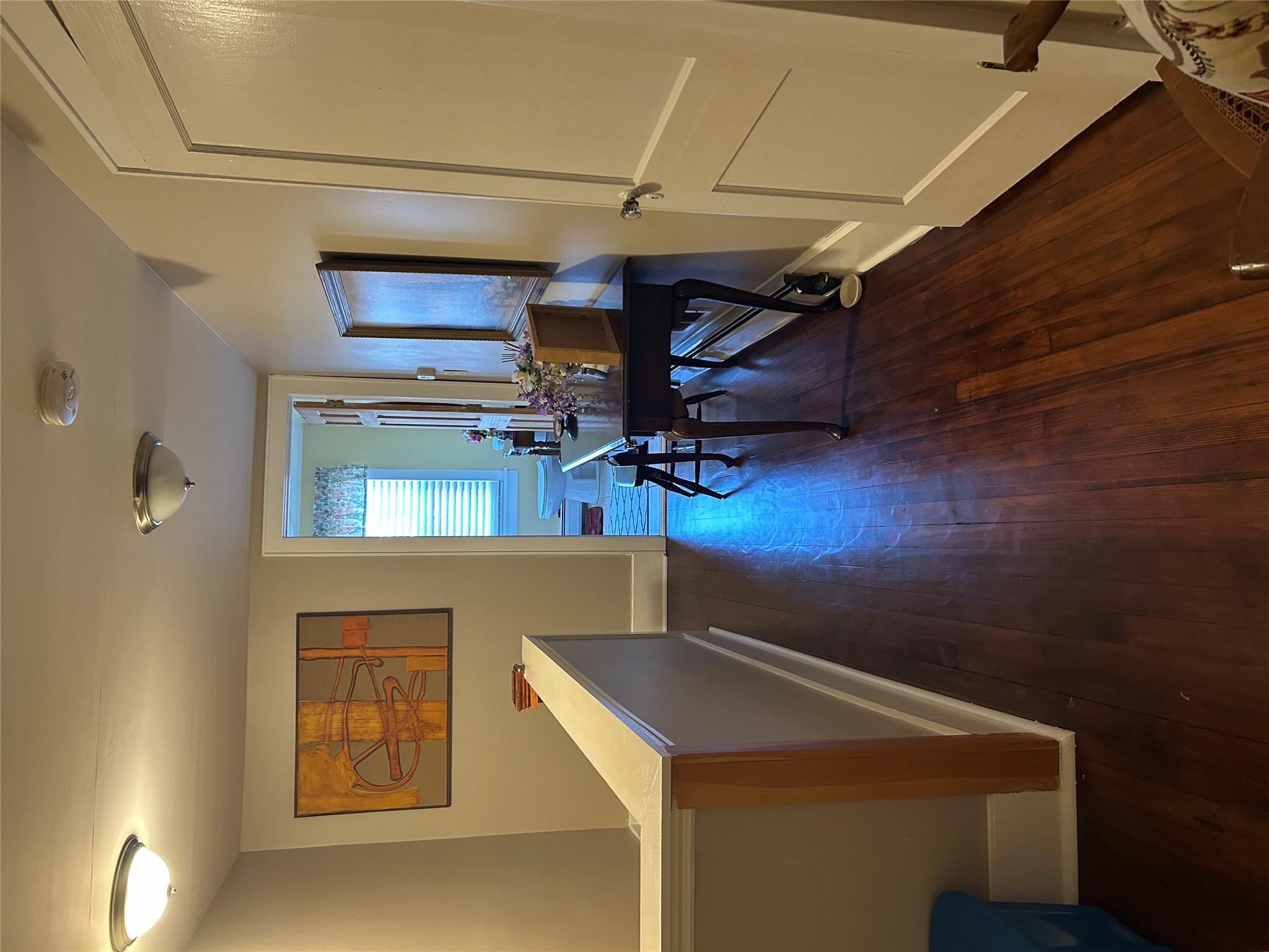199 Washington Street Poughkeepsie, NY 12601 - Photo 26 of 32 Corridor with baseboards and dark wood-style flooring