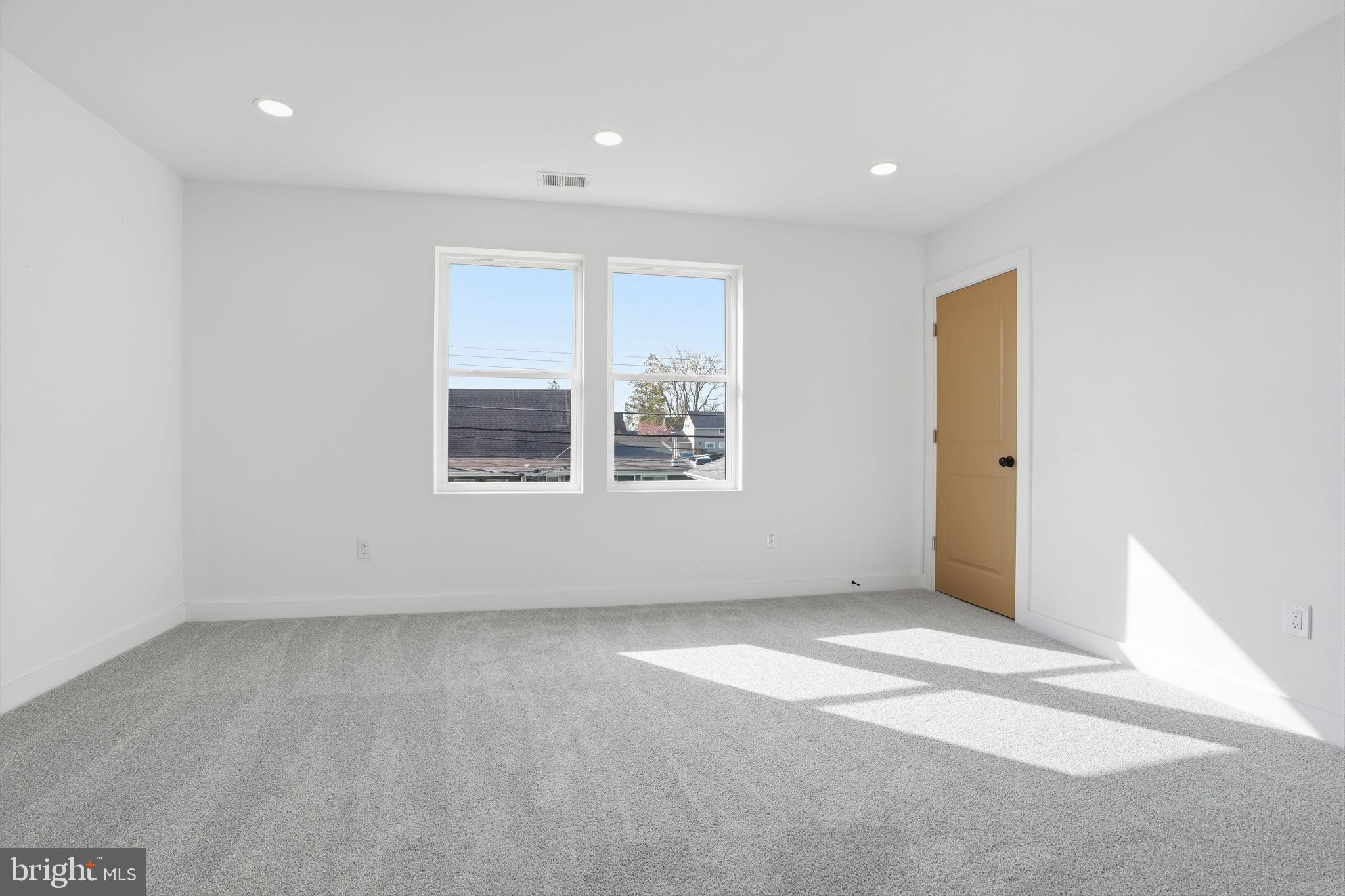 14 Inlet Road Levittown, PA 19057 - Photo 21 of 31 an empty room with a window