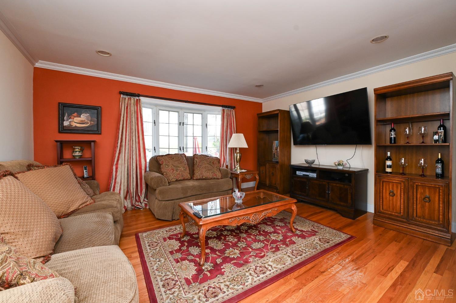23 Fordham Road Old Bridge, NJ 08859 - Photo 2 of 16 a living room with furniture and a flat screen tv