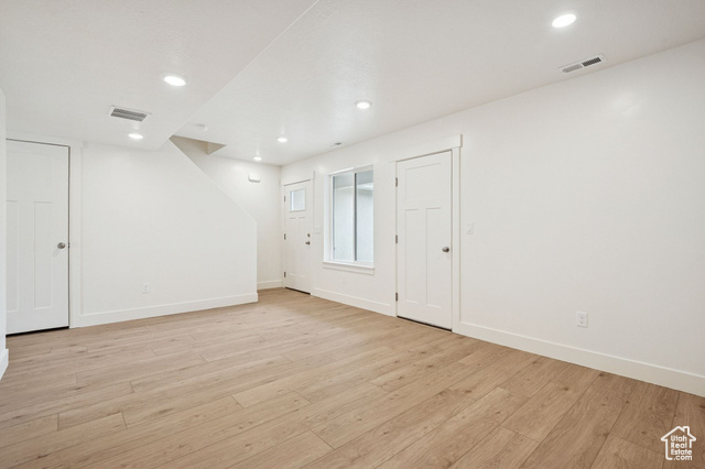 1615 North Angel Street, Unit H Layton, UT 84041 - Photo 15 of 55 Empty room featuring light wood finished floors and recessed lighting