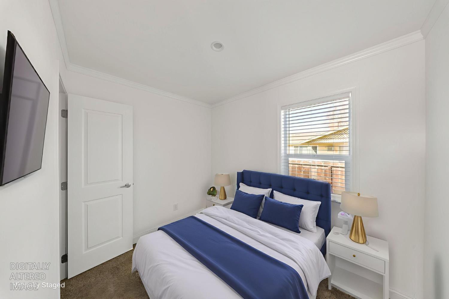 2030 East Grayson Road, Unit 41 Ceres, CA 95307 - Photo 11 of 21 Please note that the image shown is a virtually staged representation of the room and is intended to provide a visual concept of the space. The actual room may differ in appearance, and the furniture and decor depicted are not included in the sale. For an accurate understanding of the property's current condition and layout, we encourage you to view the home in person. Thank you