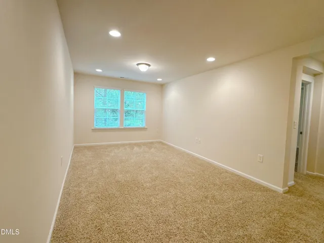 a view of a room with an outdoor space