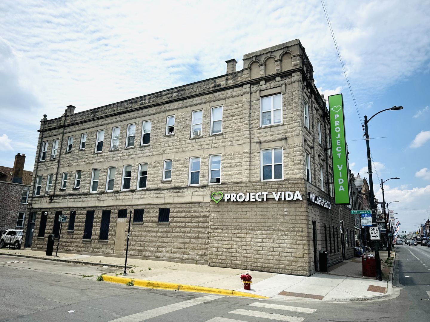 a front view of a building with street view
