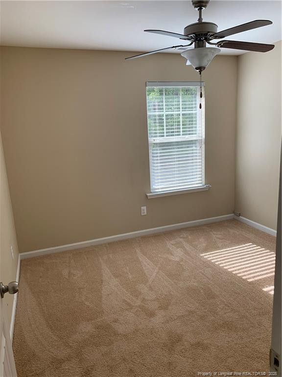 261 River Oaks St Spring Lake Spring Lake, NC 28390 - Photo 13 of 38 a view of an empty room with a window