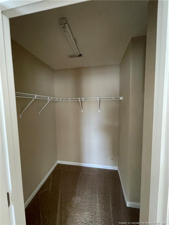 261 River Oaks St Spring Lake Spring Lake, NC 28390 - Photo 25 of 38 a view of an empty walk in closet