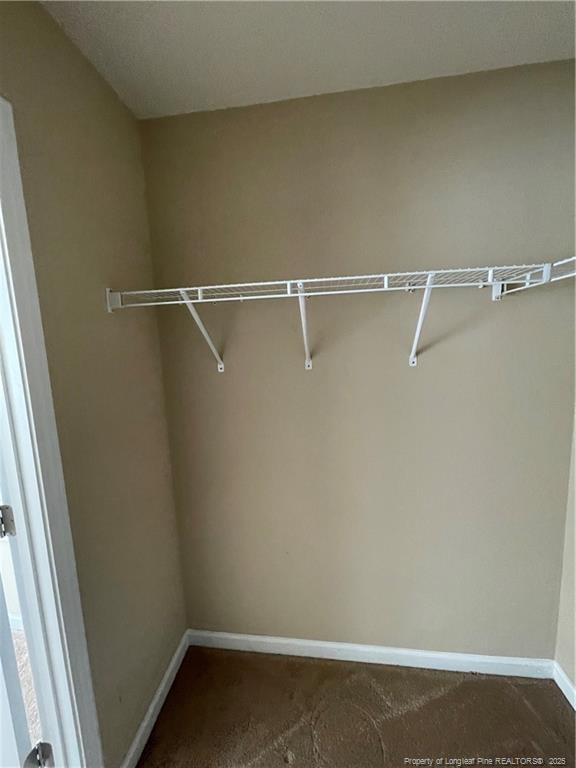 261 River Oaks St Spring Lake Spring Lake, NC 28390 - Photo 26 of 38 a view of a room with racks on the wall