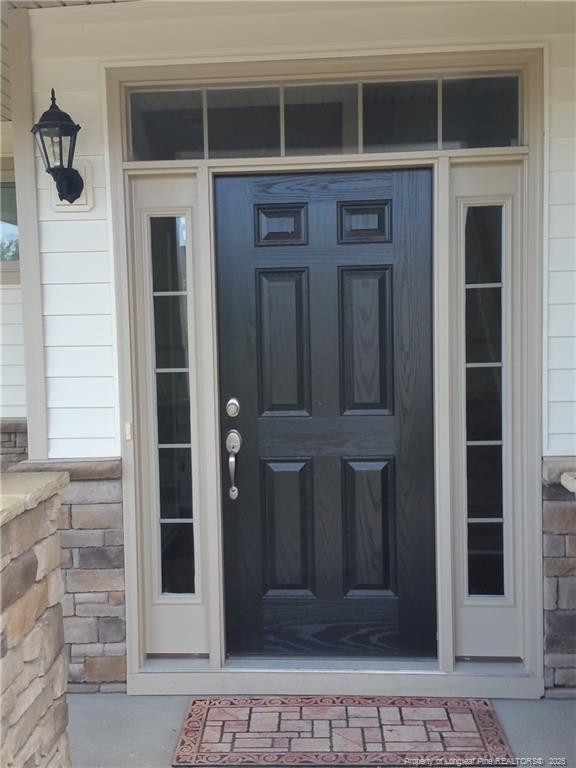 261 River Oaks St Spring Lake Spring Lake, NC 28390 - Photo 3 of 38 a view of a door of the house