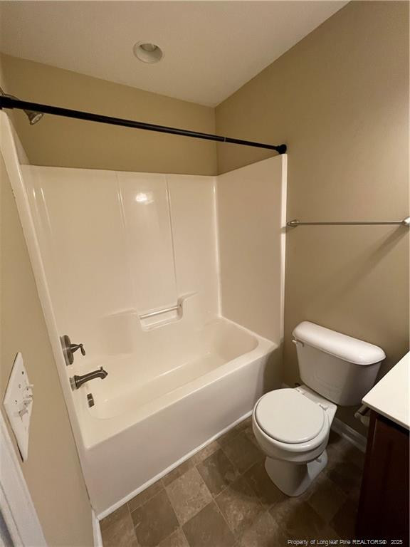 261 River Oaks St Spring Lake Spring Lake, NC 28390 - Photo 33 of 38 a white toilet sitting next to a bath tub