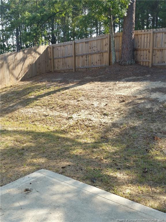 261 River Oaks St Spring Lake Spring Lake, NC 28390 - Photo 38 of 38 a view of a backyard