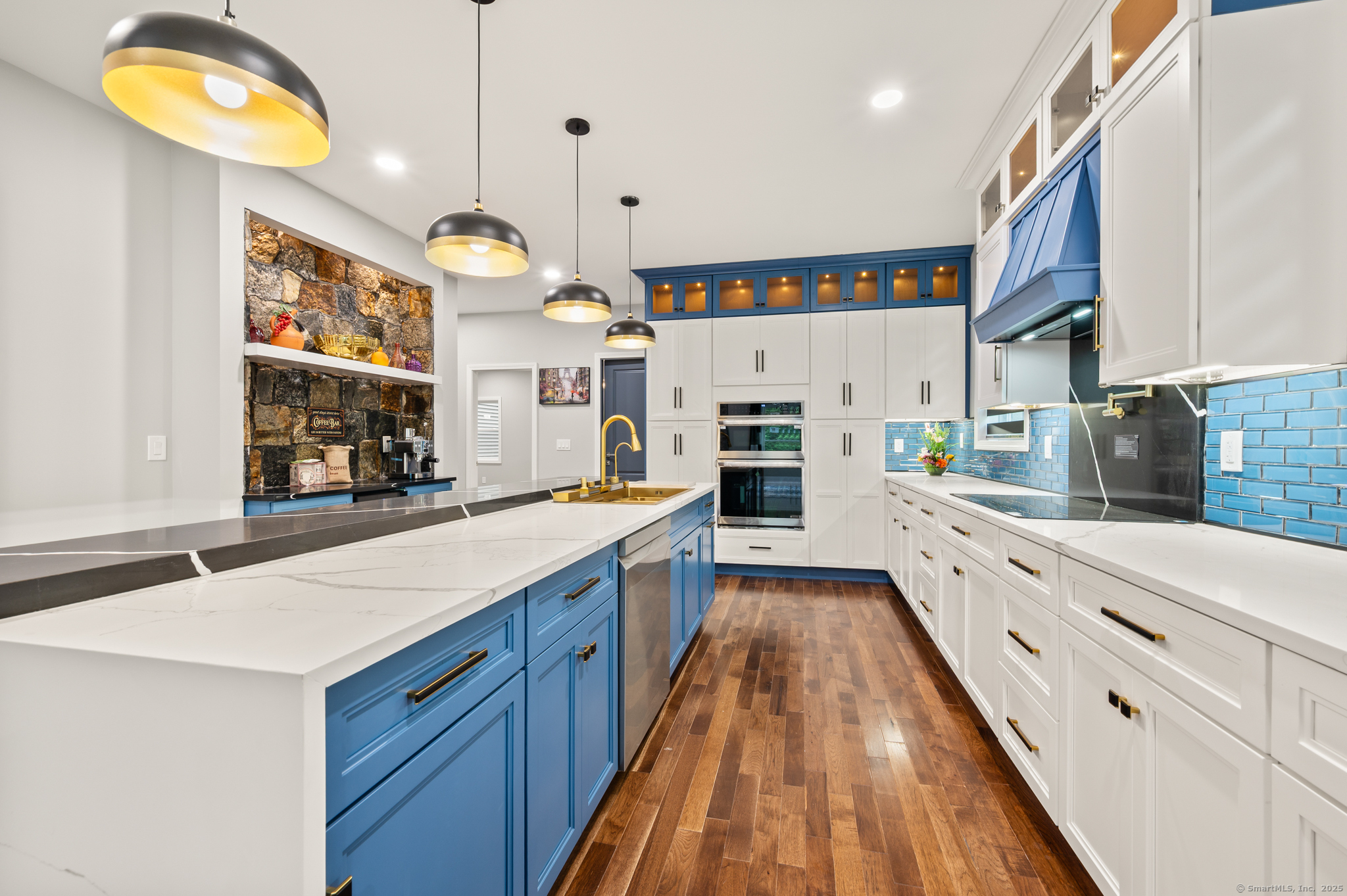 370 West Mountain Road West Simsbury, CT 06092 - Photo 12 of 39 a large kitchen with stainless steel appliances granite countertop a lot of counter space and a sink