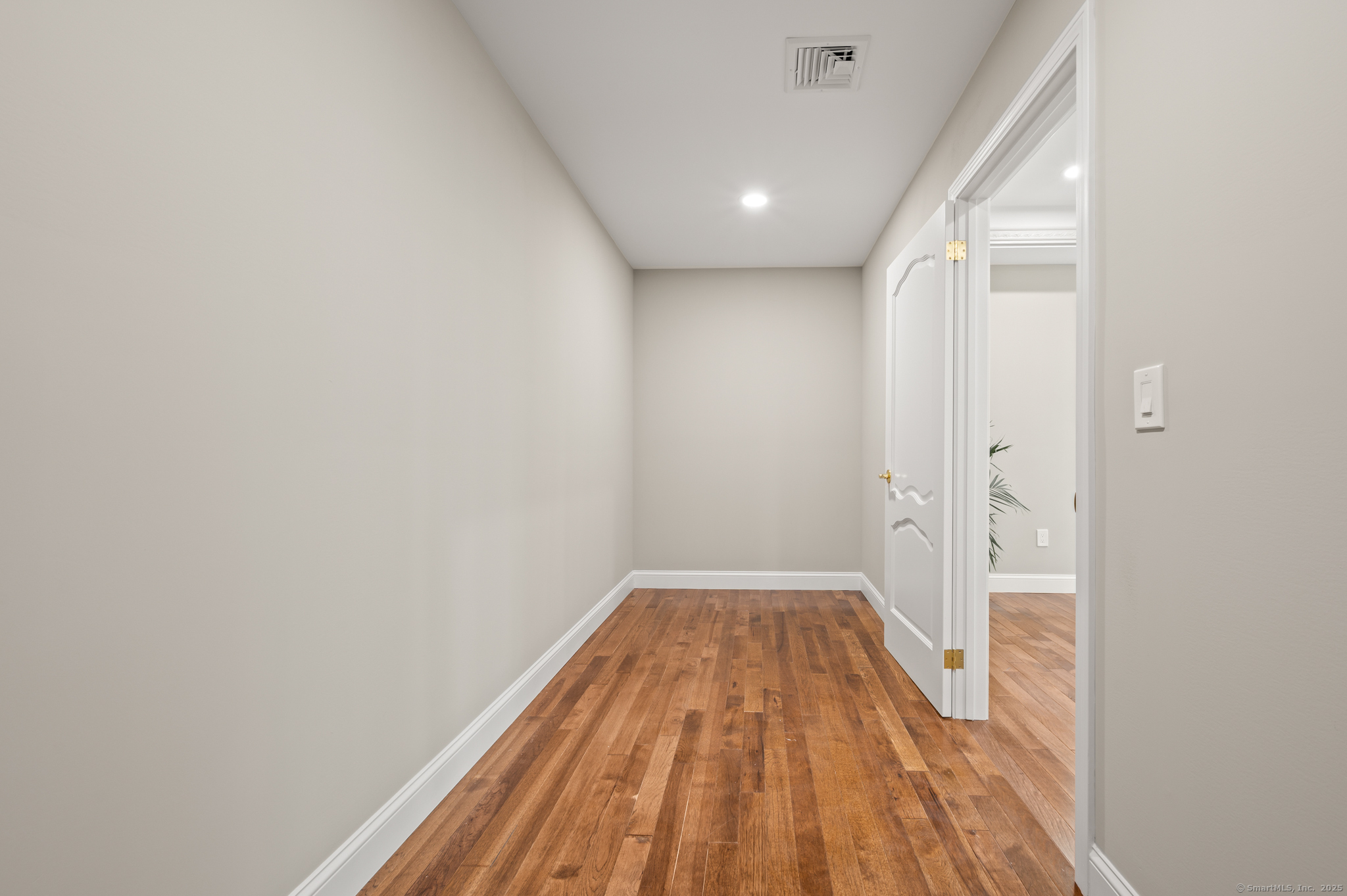 370 West Mountain Road West Simsbury, CT 06092 - Photo 24 of 39 a view of wooden floor in an empty room