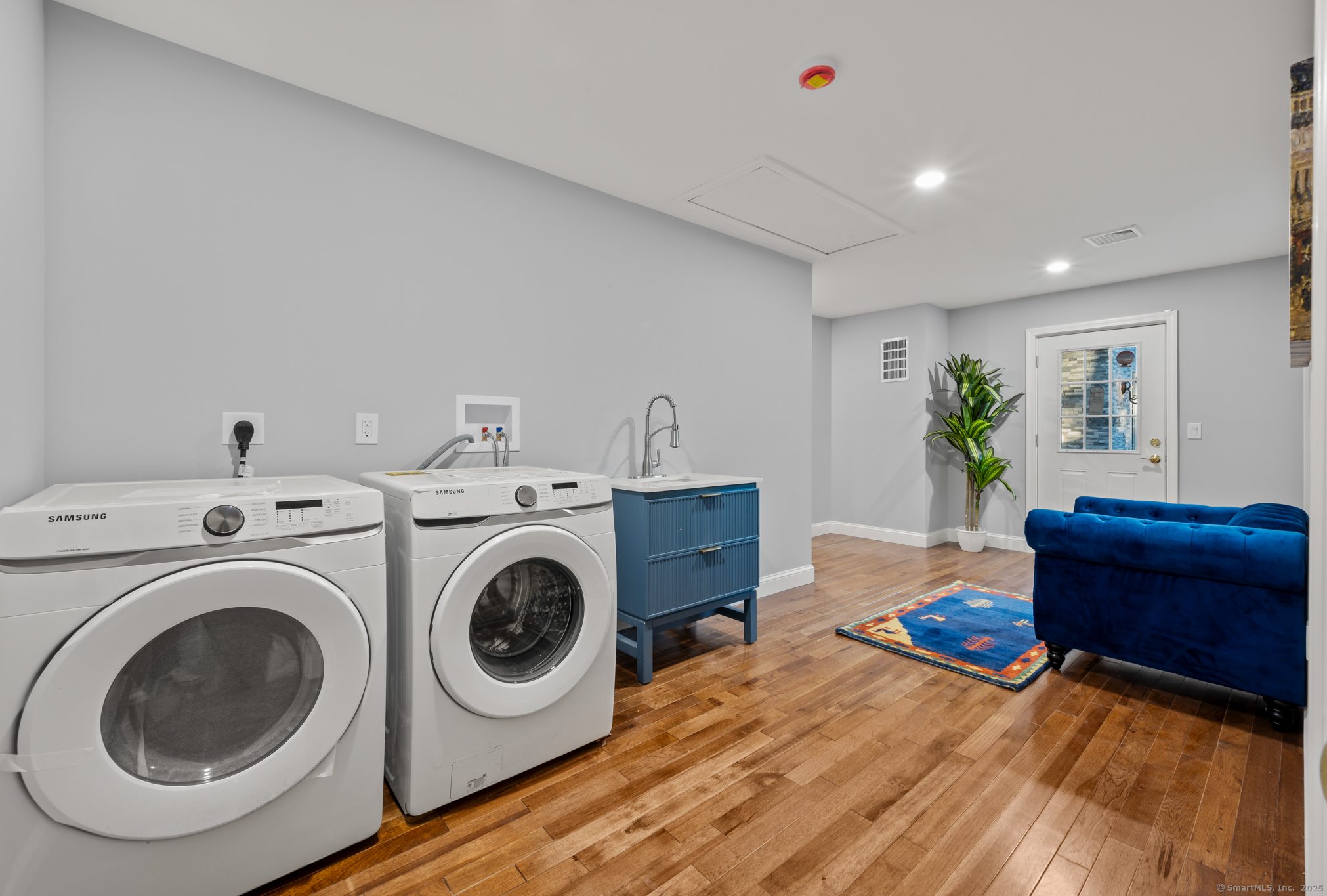 370 West Mountain Road West Simsbury, CT 06092 - Photo 30 of 39 a living room with furniture and a wooden floor