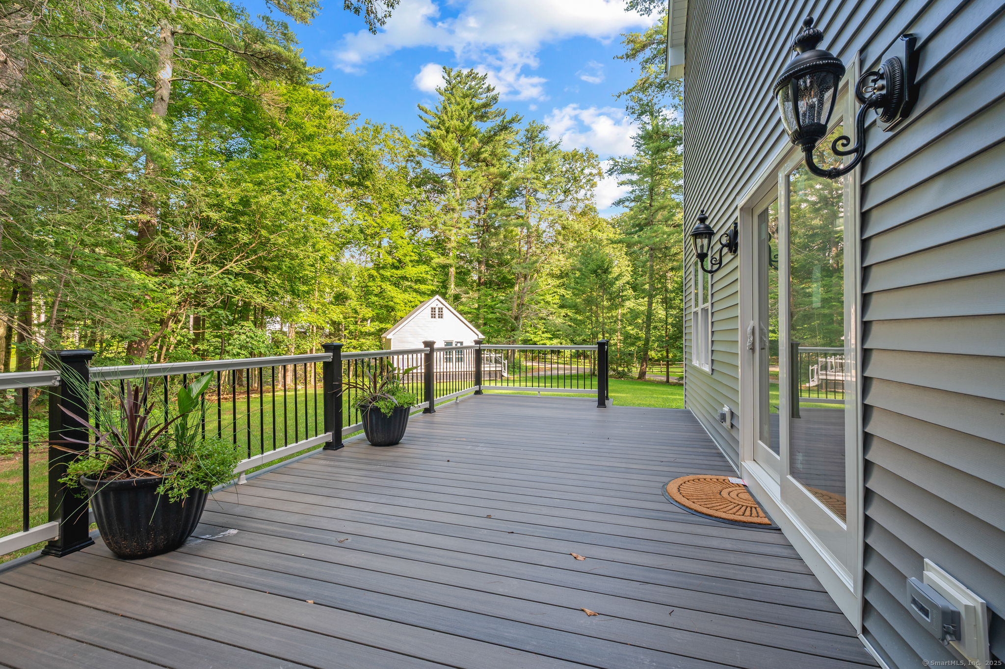 370 West Mountain Road West Simsbury, CT 06092 - Photo 31 of 39 a view of a deck with wooden floor and fence