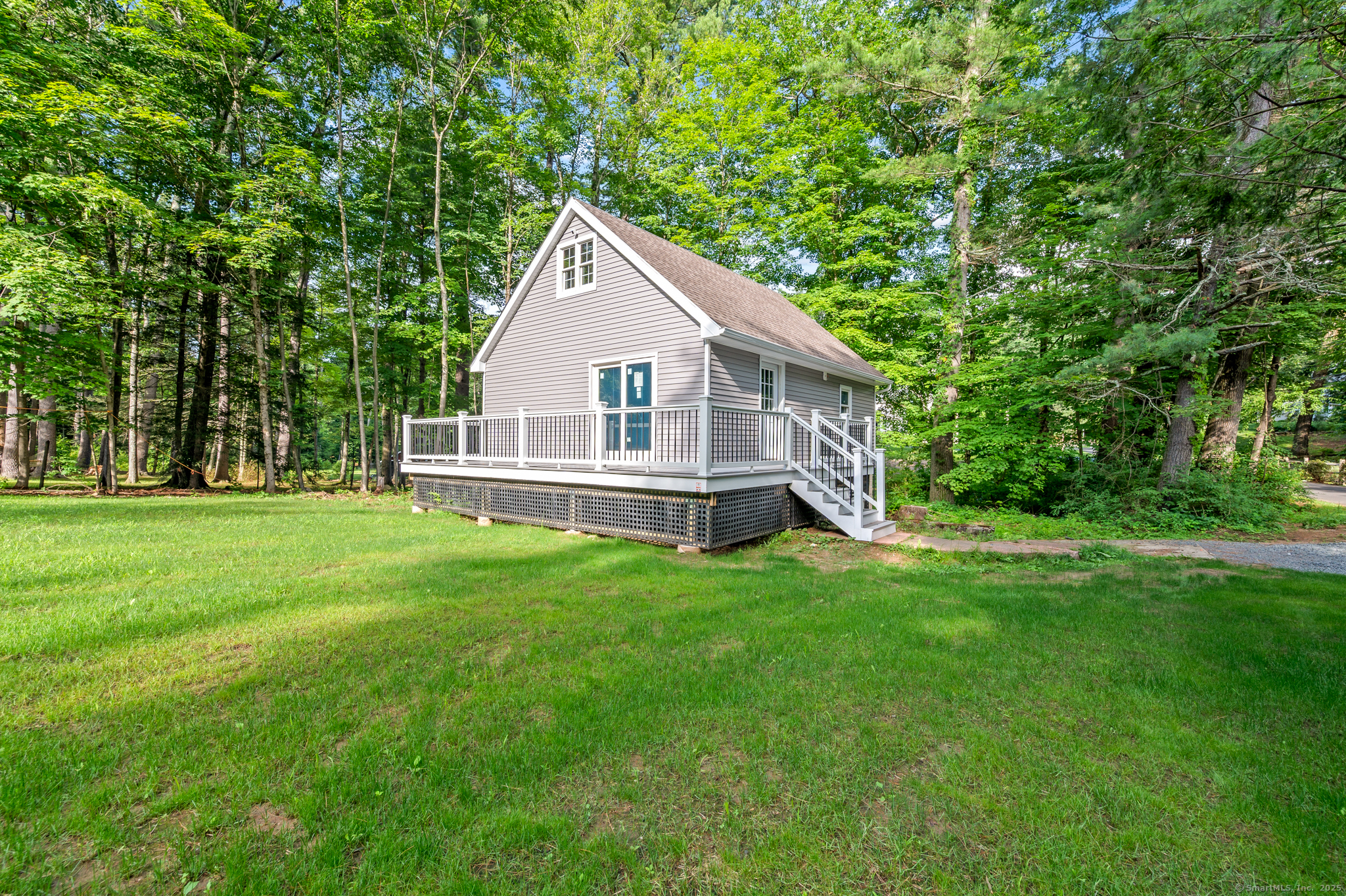 370 West Mountain Road West Simsbury, CT 06092 - Photo 35 of 39 a view of a house with a yard