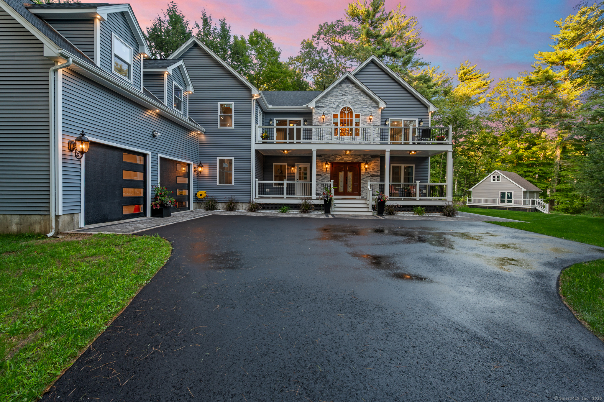 370 West Mountain Road West Simsbury, CT 06092 - Photo 39 of 39 a front view of a house with a garden