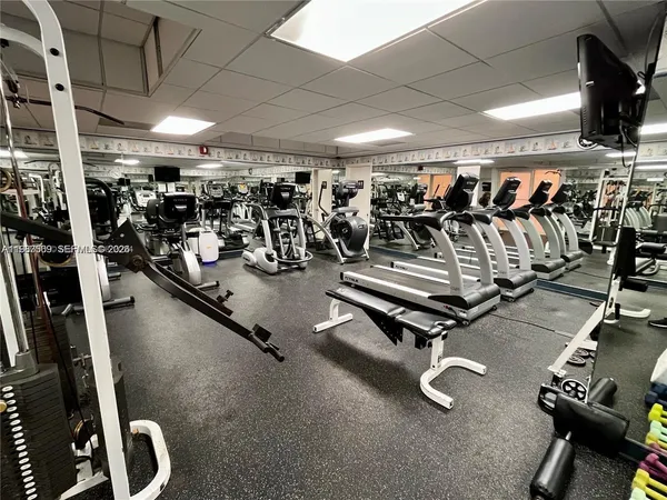 a view of a room with gym equipment