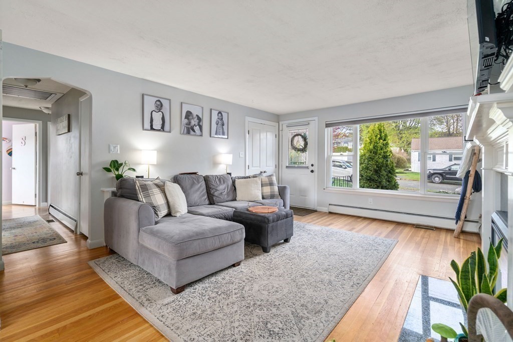 172 Circle Drive Waltham, MA 02452 - Photo 11 of 23 a living room with furniture and a large window