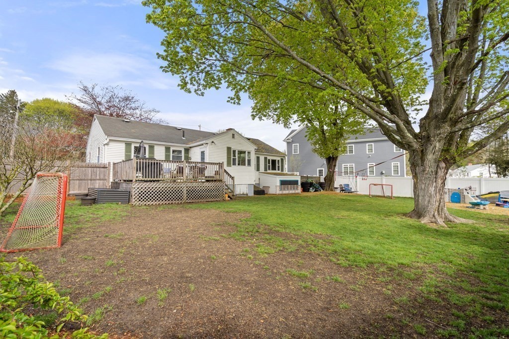 172 Circle Drive Waltham, MA 02452 - Photo 21 of 23 a front view of a house with a yard and trees