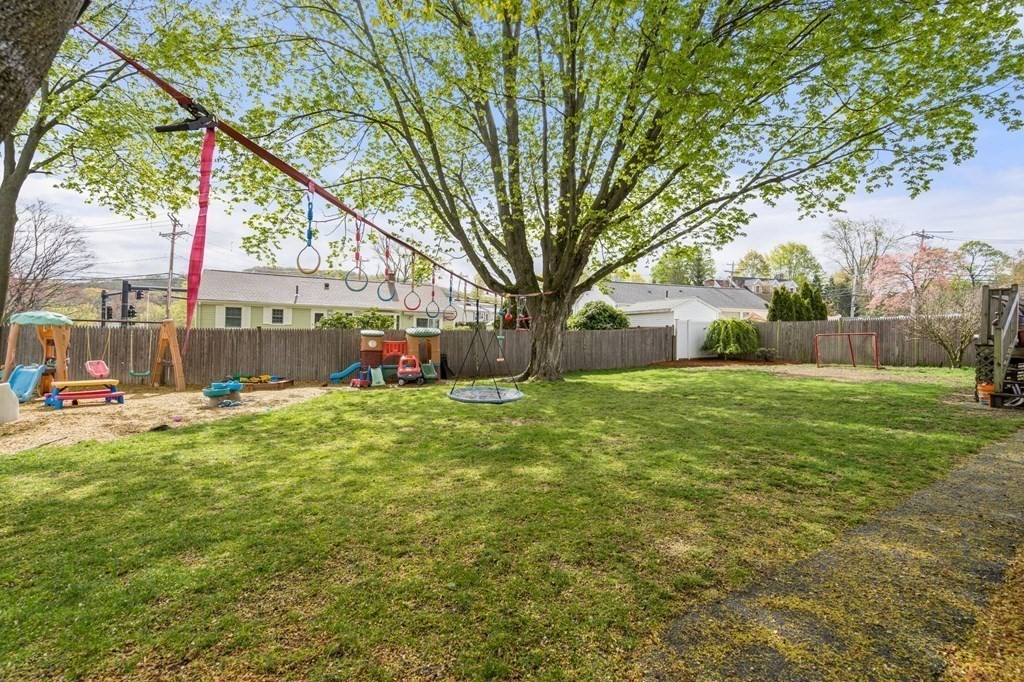 172 Circle Drive Waltham, MA 02452 - Photo 22 of 23 a view of a house with backyard and a tree