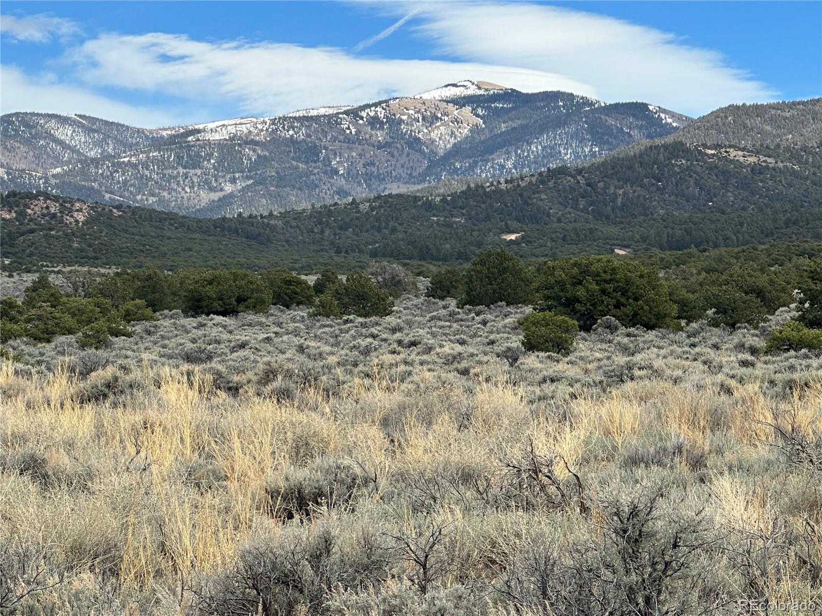 a view of a dry mountains in the distance
