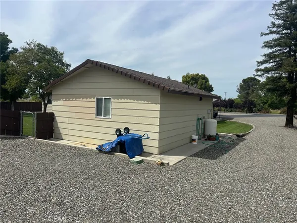 a house view with a backyard space