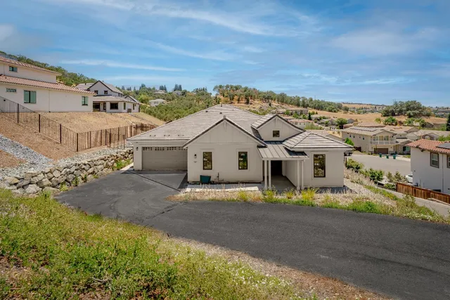 front view of a house with a street