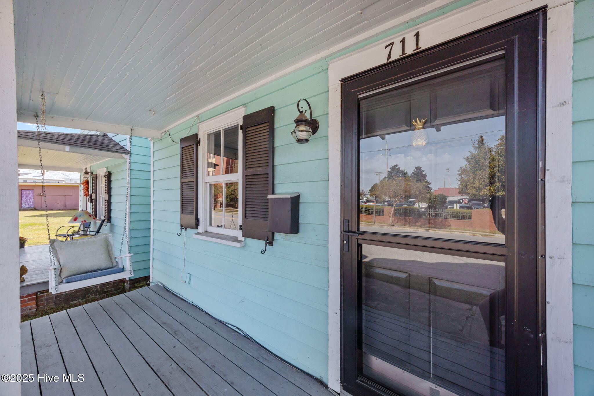 711 Queen Street New Bern, NC 28560 - Photo 18 of 28 Adorable Front Porch Swing