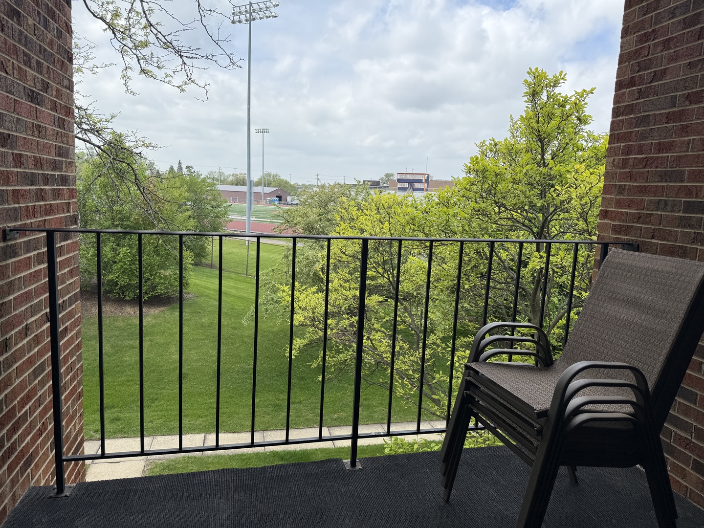 740 Weidner Road, Unit 206 Buffalo Grove, IL 60089 - Photo 18 of 24 a view of a balcony with chairs