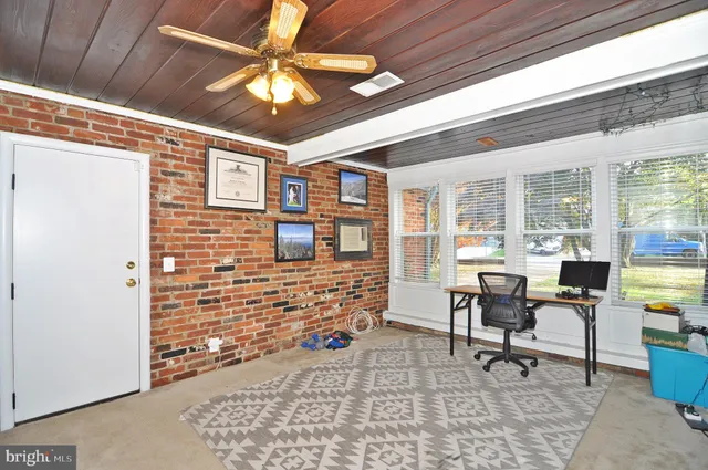 a view of a livingroom with furniture