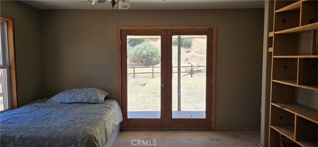 3020 Lebec Oaks Road Lebec, CA 93243 - Photo 11 of 12 a bed sitting in a bedroom next to a window