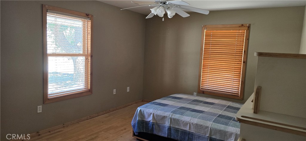 3020 Lebec Oaks Road Lebec, CA 93243 - Photo 8 of 12 a bedroom with a bed and a window