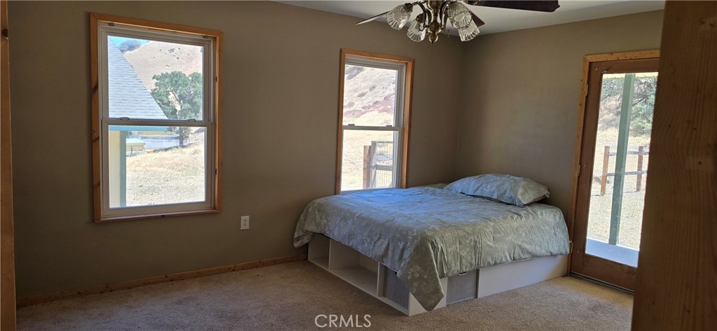 3020 Lebec Oaks Road Lebec, CA 93243 - Photo 10 of 12 a bedroom with a bed and window