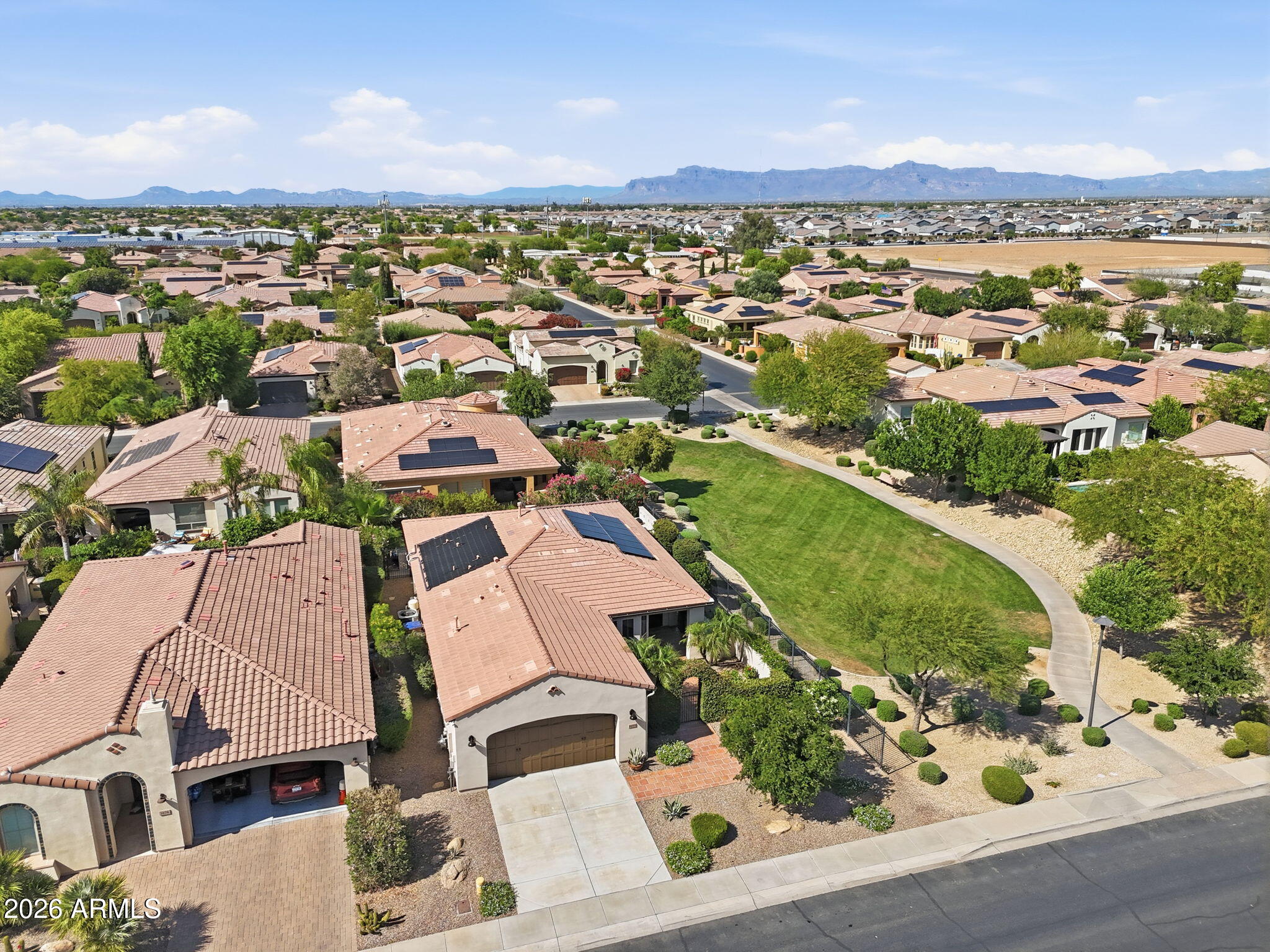 1694 East Grand Ridge Road Queen Creek, AZ 85140 - Photo 44 of 61 an aerial view of residential houses with outdoor space