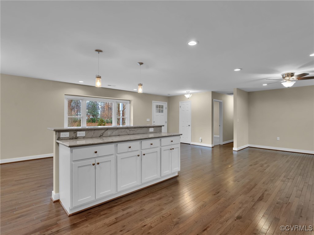 12110 Bailey Bridge Road Midlothian, VA 23112 - Photo 14 of 21 Kitchen featuring dark wood-type flooring, hanging