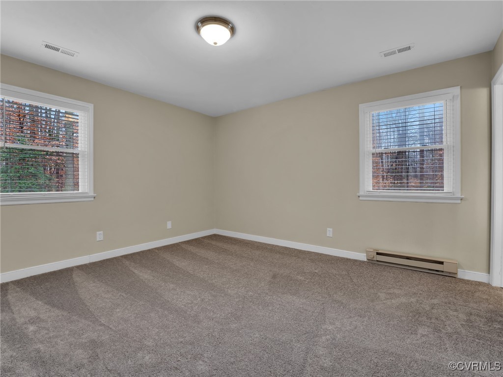 12110 Bailey Bridge Road Midlothian, VA 23112 - Photo 16 of 21 Carpeted empty room featuring a healthy amount of