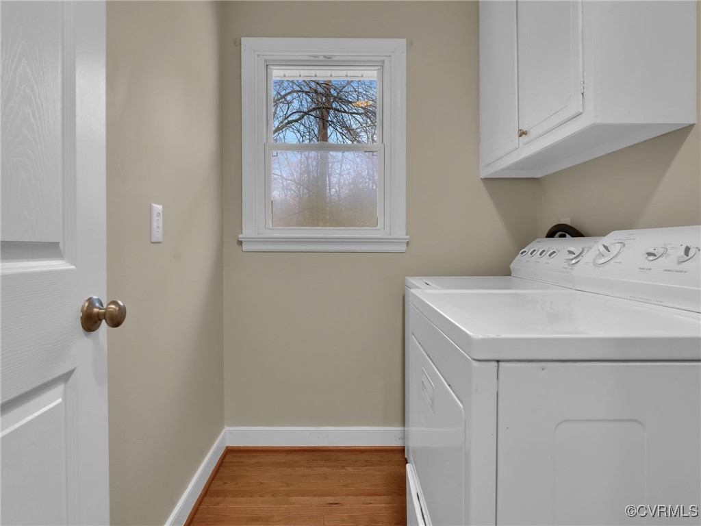 12110 Bailey Bridge Road Midlothian, VA 23112 - Photo 21 of 21 Laundry room featuring cabinets, light wood-type f