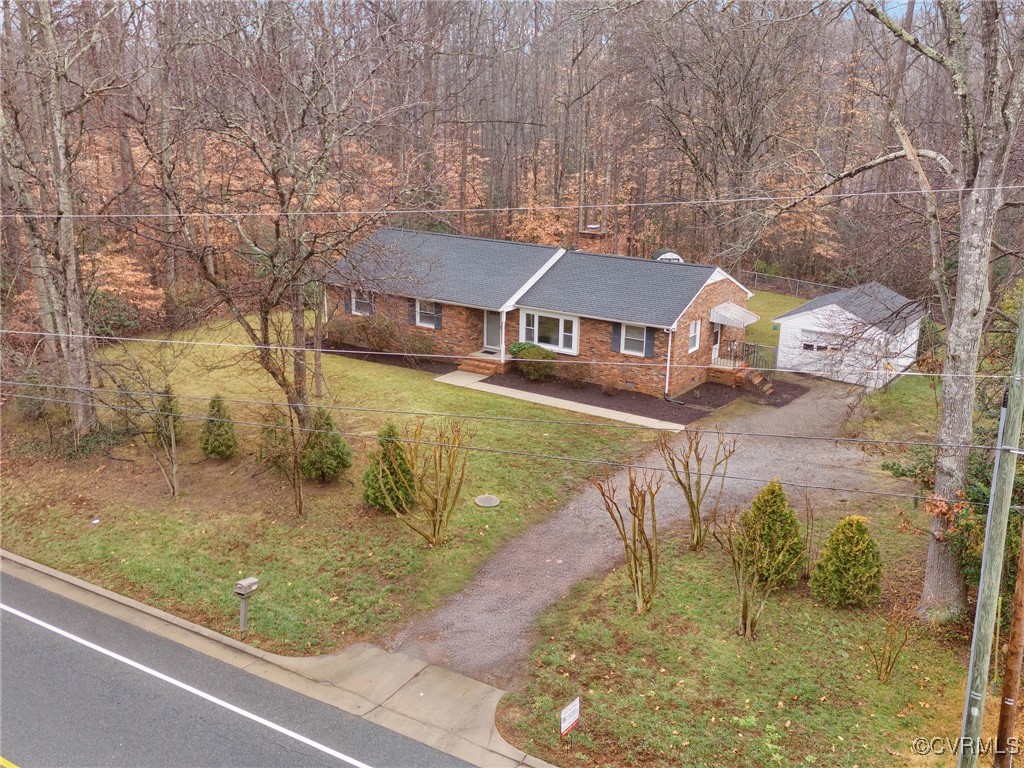 12110 Bailey Bridge Road Midlothian, VA 23112 - Photo 4 of 21 View of front facade with a front lawn