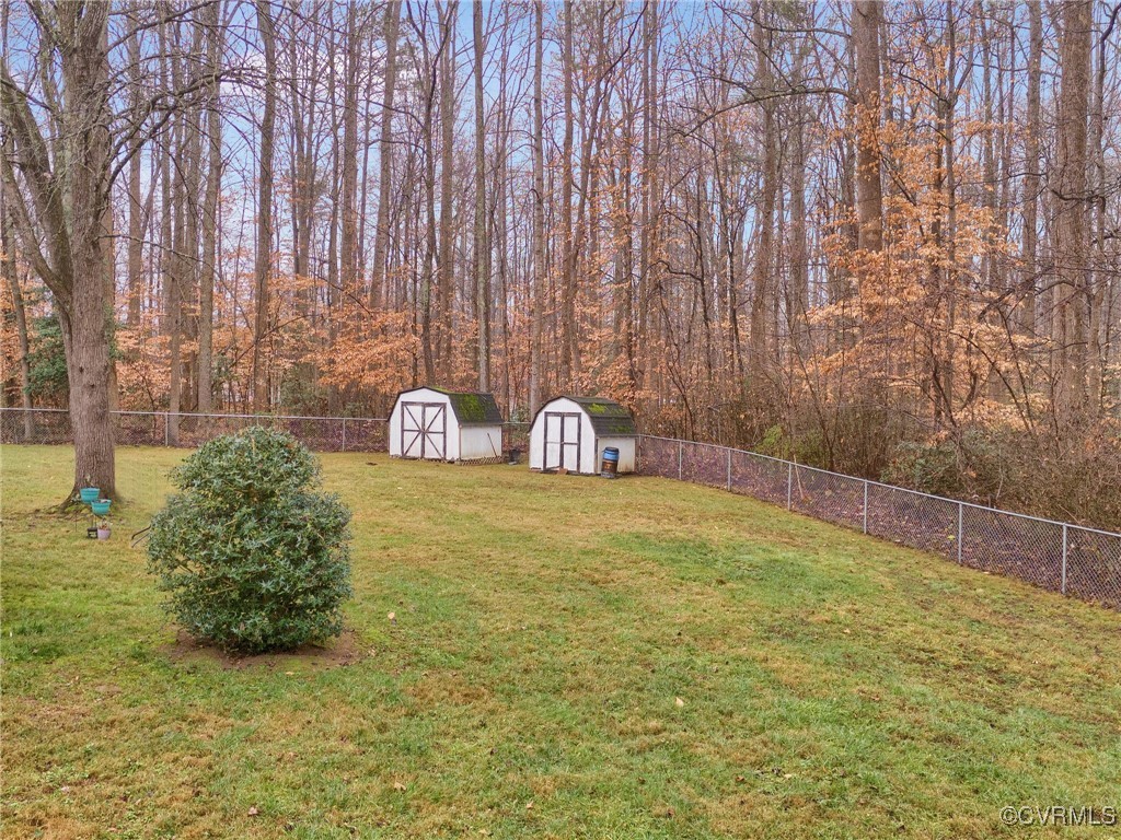 12110 Bailey Bridge Road Midlothian, VA 23112 - Photo 7 of 21 View of yard featuring a storage shed