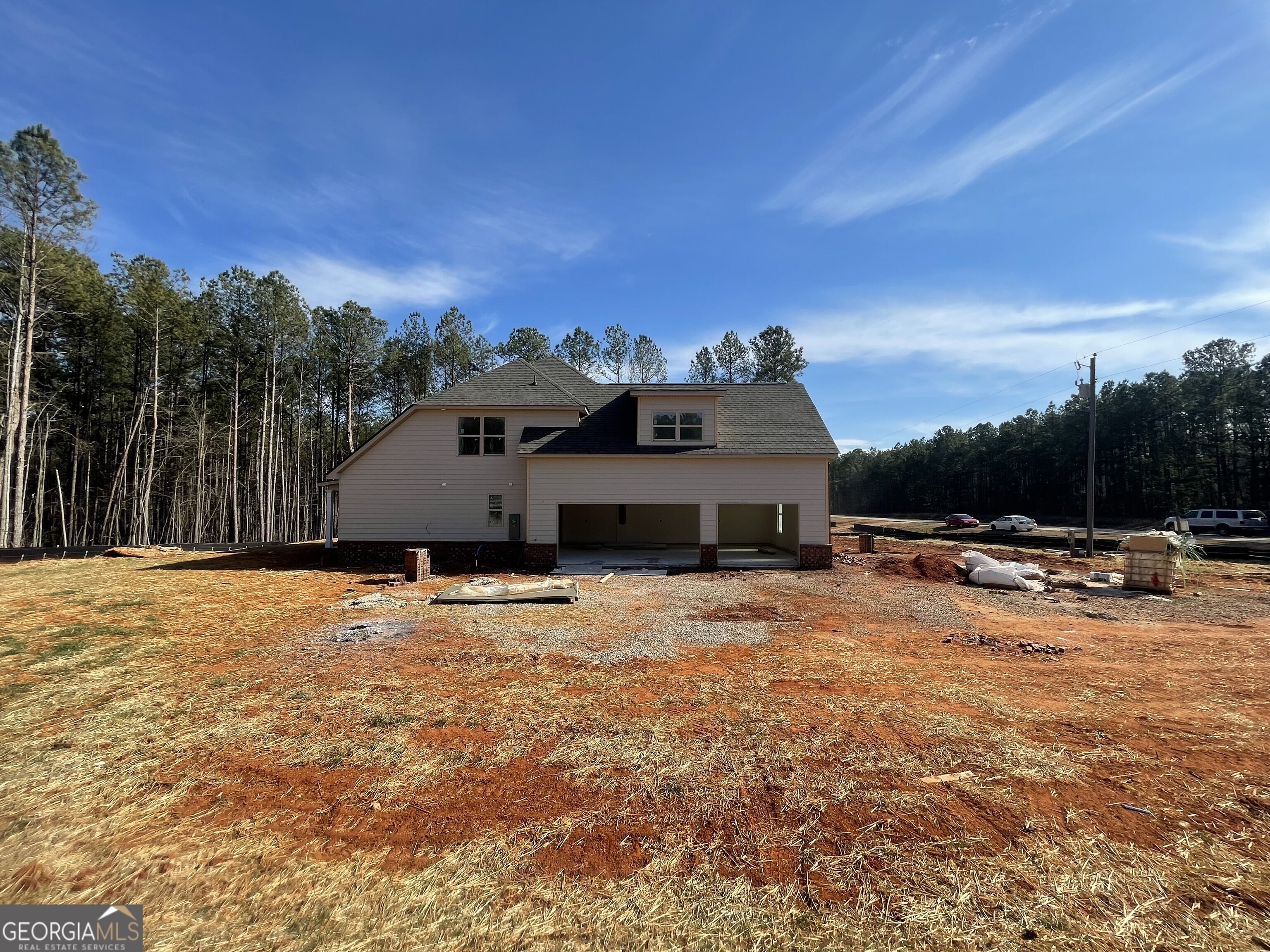 2325 New Hope Road, Unit (LOT 4) Locust Grove, GA 30248 - Photo 2 of 11 a view of a house with pool and a yard