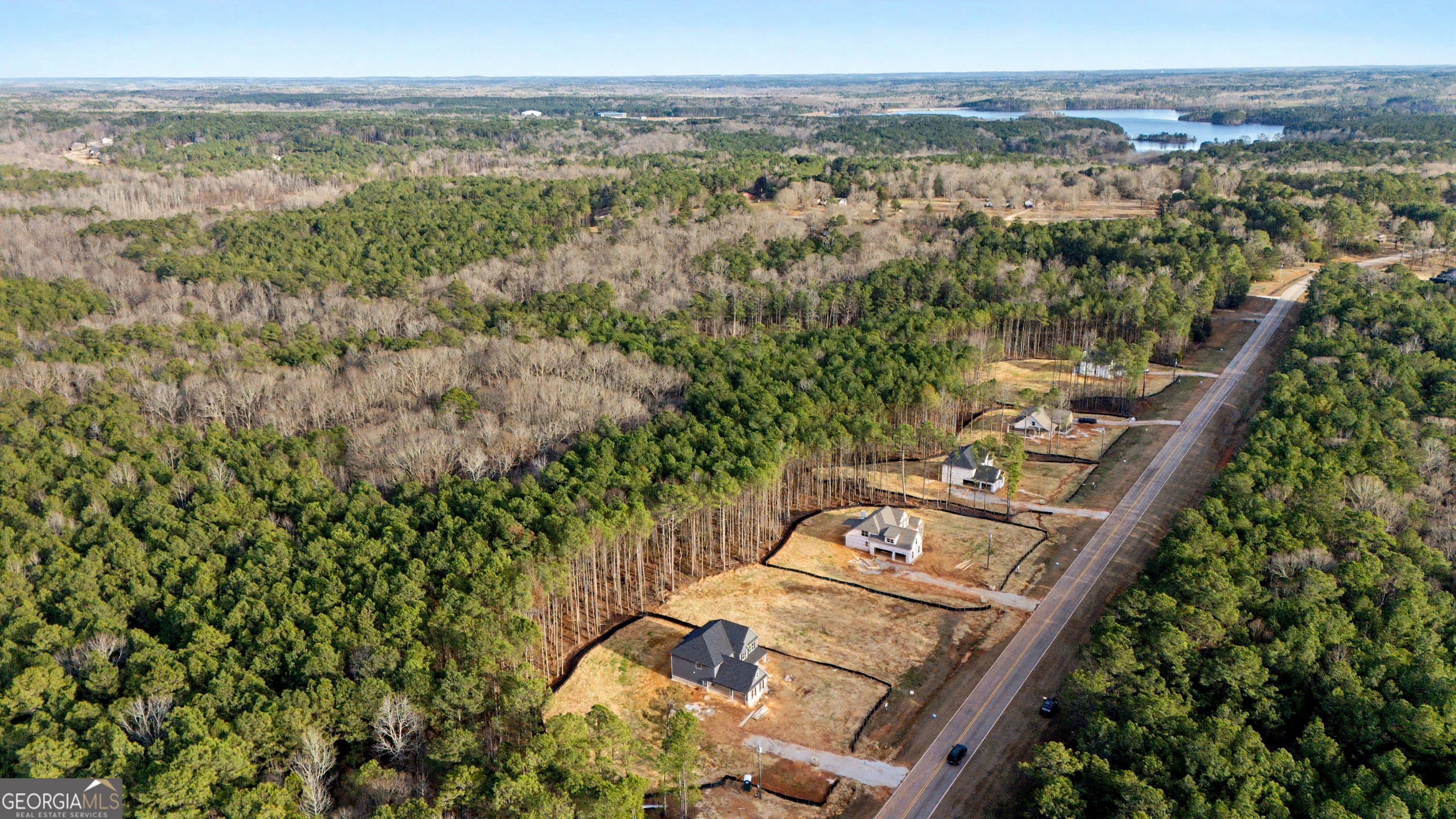 2325 New Hope Road, Unit (LOT 4) Locust Grove, GA 30248 - Photo 6 of 11 an aerial view of multiple house