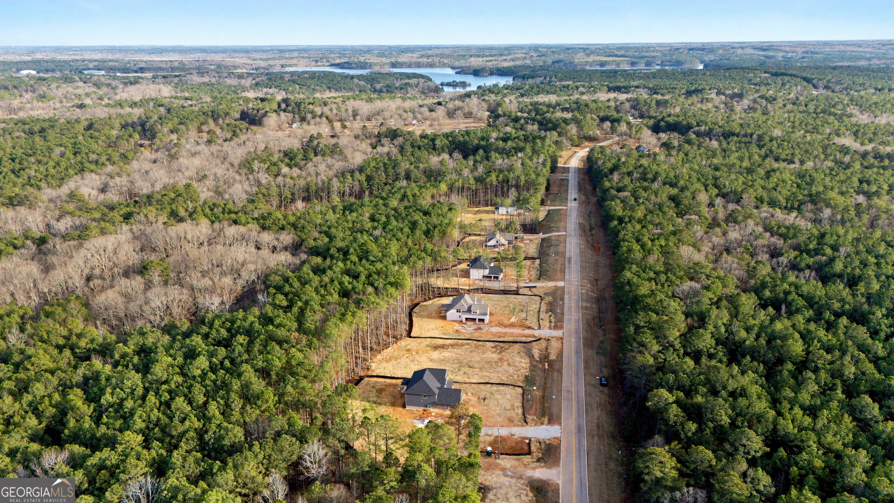 2325 New Hope Road, Unit (LOT 4) Locust Grove, GA 30248 - Photo 10 of 11 an aerial view of multiple house