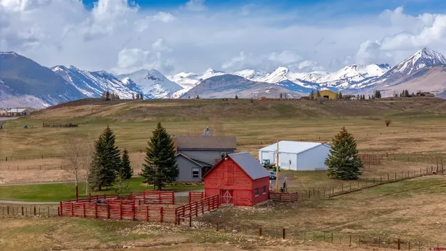 a view of an ocean and a yard