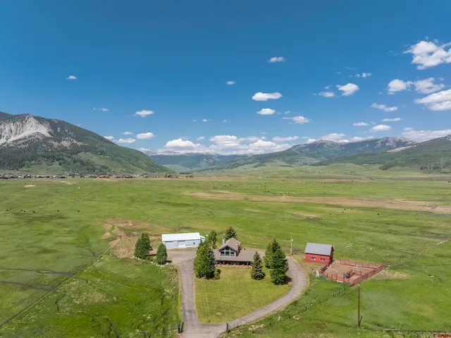 a view of lake with green space