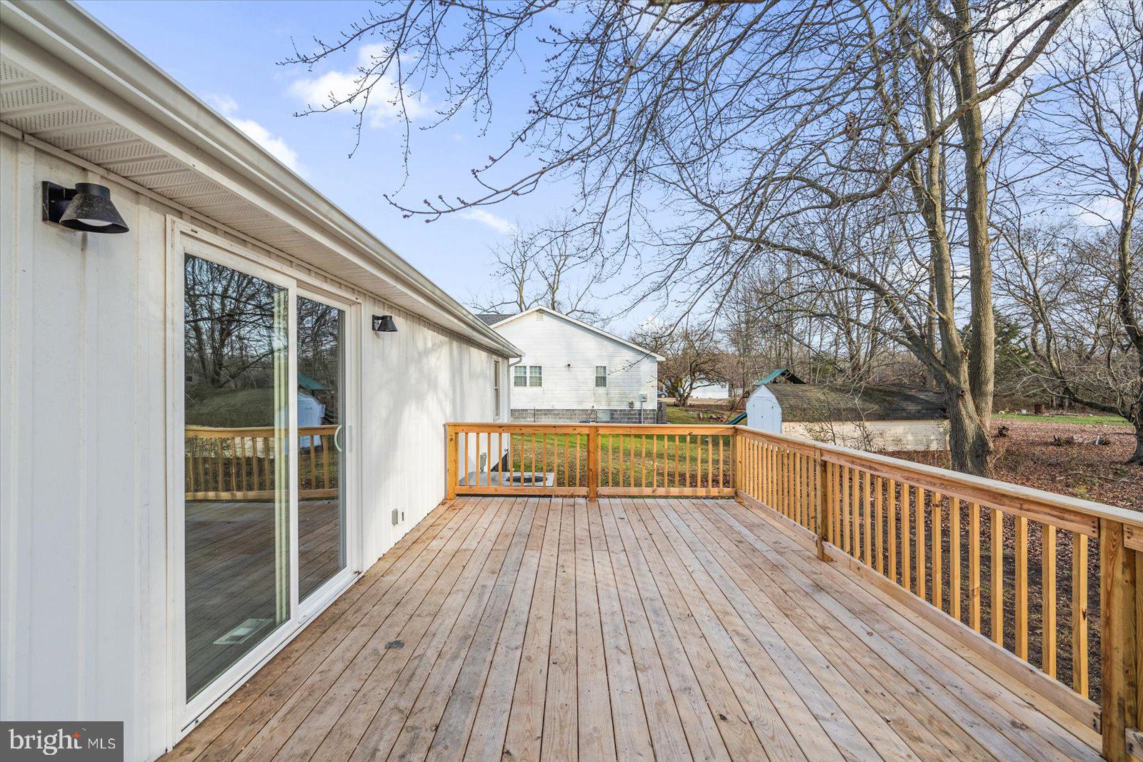 36451-3 3 Bridges Road Willards, MD 21874 - Photo 36 of 44 a view of porch with wooden deck and floor